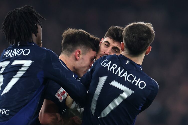LONDON, ENGLAND: Manuel Ugarte of Manchester United clashes with Kai Havertz of Arsenal during the Emirates FA Cup Third Round match between Arsena...