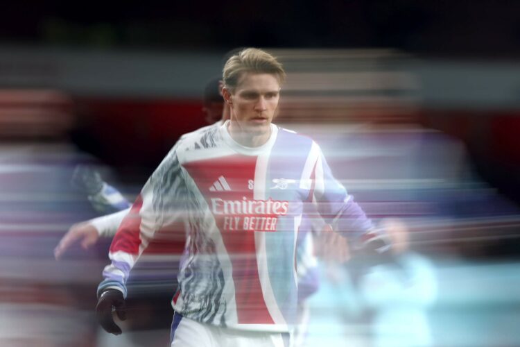 LONDON, ENGLAND - JANUARY 07: Martin Odegaard of Arsenal warms up prior to the Carabao Cup Semi Final First Leg match between Arsenal and Newcastle...