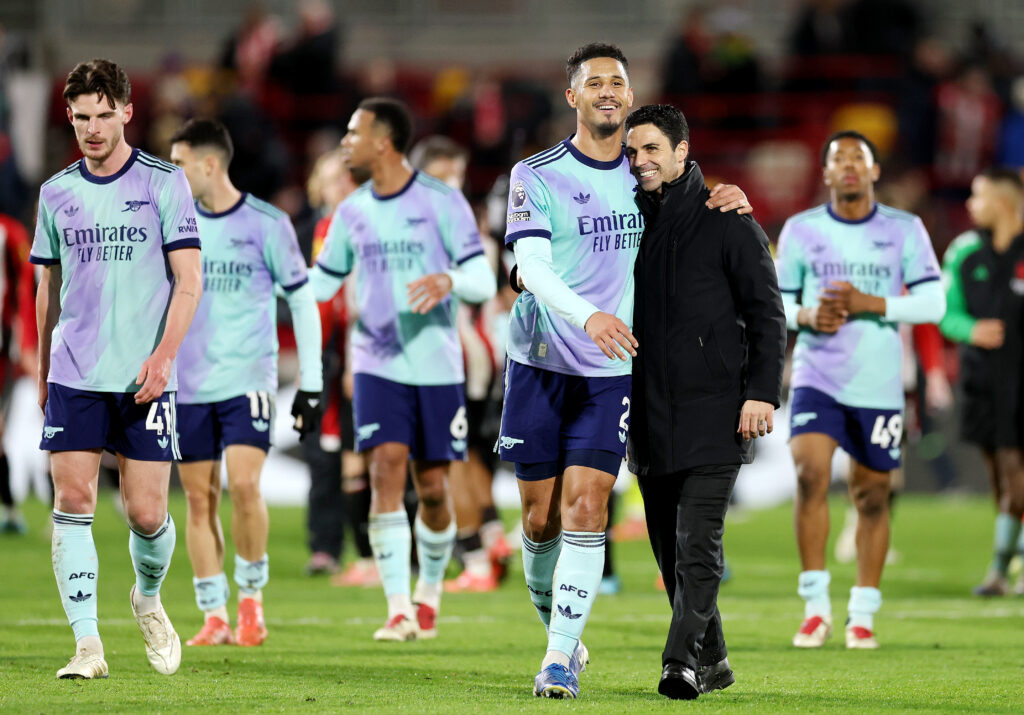 Arsenal planning Dubai trip 2 BRENTFORD, ENGLAND - JANUARY 01: Mikel Arteta, Manager of Arsenal, interacts with William Saliba of Arsenal after the Premier League match between Brentford FC and Arsenal FC at the Brentford Community Stadium on January 01, 2025 in Brentford, England. (Photo by Richard Heathcote/Getty Images)