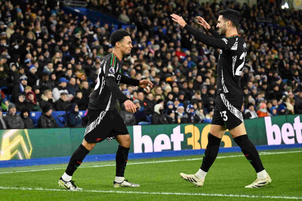 BRIGHTON, ENGLAND - JANUARY 04: Ethan Nwaneri of Arsenal celebrates scoring his team's first goal with Mikel Merino during the Premier League match between Brighton & Hove Albion FC and Arsenal FC at Amex Stadium on January 04, 2025 in Brighton, England. (Photo by Mike Hewitt/Getty Images)