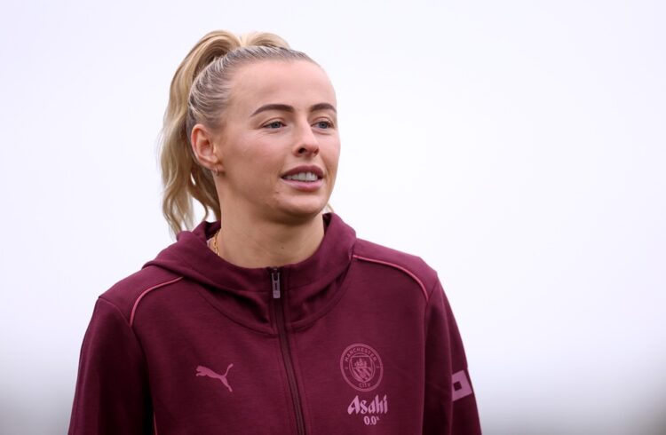 LIVERPOOL, ENGLAND: Chloe Kelly of Manchester City looks on as she inspects the pitch prior to the Barclays Women's Super League match between Ever...