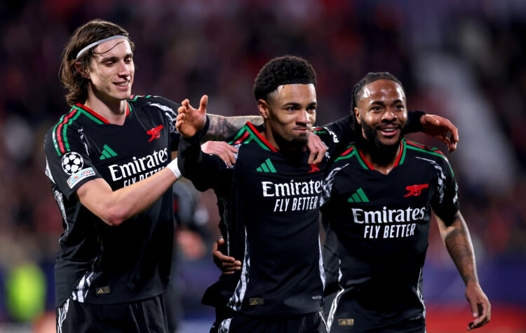 GIRONA, SPAIN - JANUARY 29: Ethan Nwaneri of Arsenal celebrates with teammates Riccardo Calafiori and Raheem Sterling after scoring his team's seco...