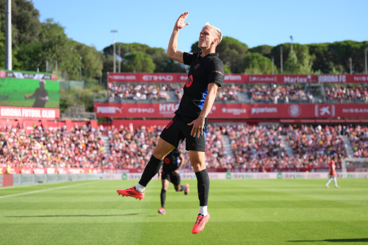 GIRONA, SPAIN - SEPTEMBER 15: Dani Olmo of FC Barcelona celebrates scoring his team's third goal during the LaLiga match between Girona FC and FC B...