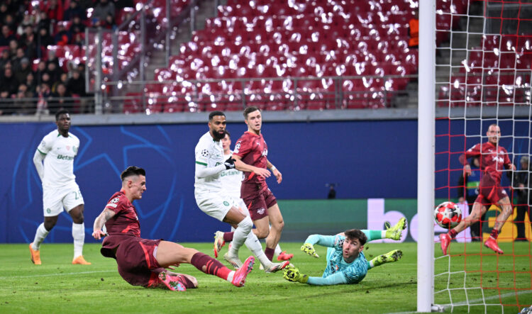 LEIPZIG, GERMANY - JANUARY 22: Benjamin Sesko of RB Leipzig scores his team's first goal as Franco Israel of Sporting CP fails to make a save durin...