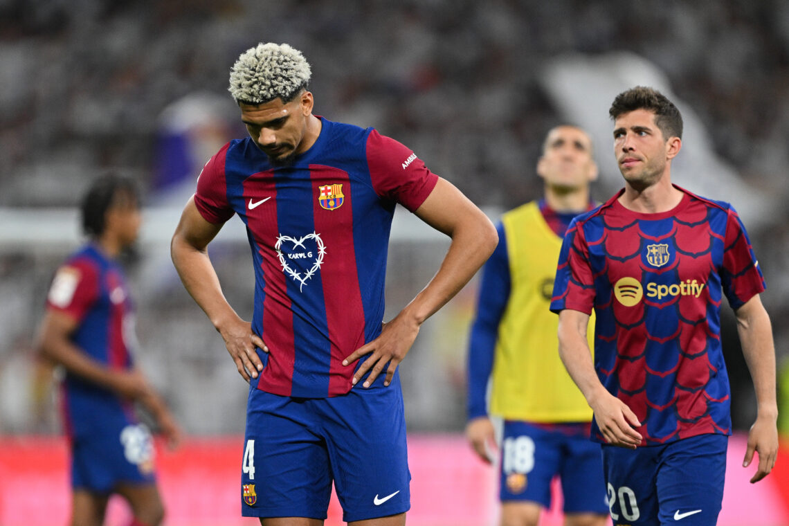 MADRID, SPAIN - APRIL 21: Ronald Araujo of FC Barcelona shows his dejection at the end of the LaLiga EA Sports match between Real Madrid CF and FC ...