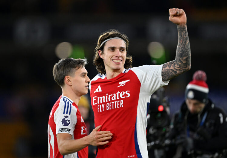WOLVERHAMPTON, ENGLAND - JANUARY 25: Riccardo Calafiori of Arsenal celebrates victory with teammate Leandro Trossard following the Premier League m...