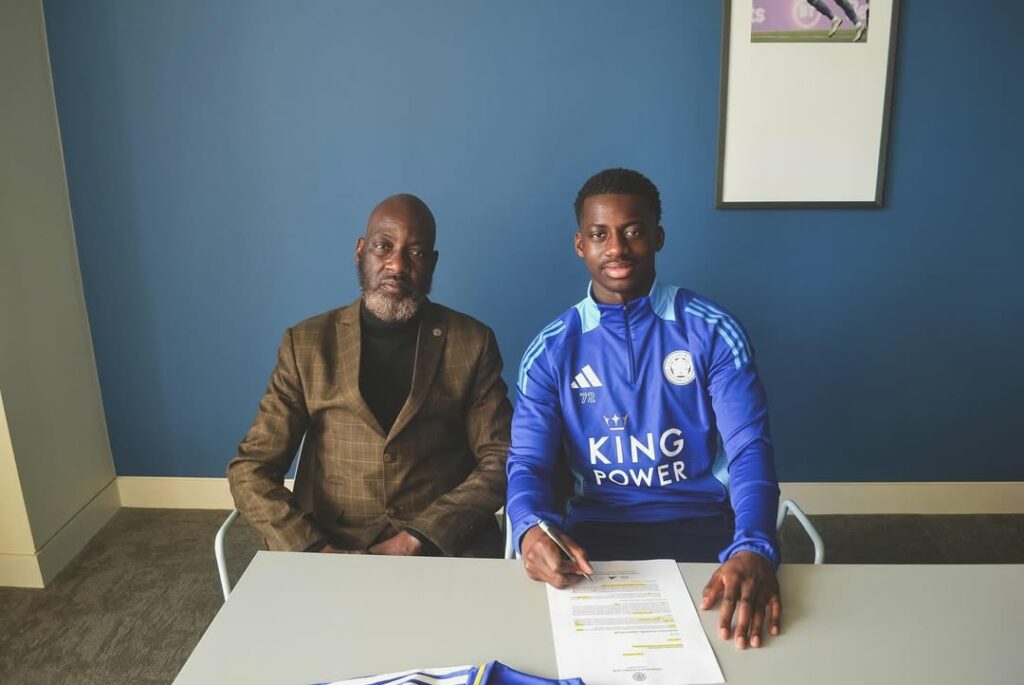 Arsenal academy player finally confirms transfer to Leicester City 2 Bless Akolbire signing his contract with Leicester City (Photo via Akolbire on Instagram)
