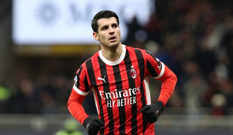 MILAN, ITALY: Alvaro Morata of AC Milan celebrates scoring his team's first goal during the Serie A match between AC Milan and Cagliari at Stadio G...