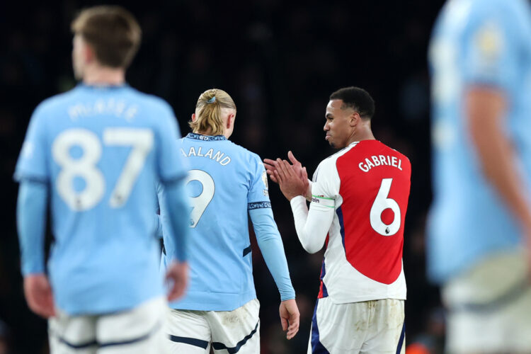 LONDON, ENGLAND - FEBRUARY 02: Erling Haaland of Manchester City is taunted by Gabriel of Arsenal after the Premier League match between Arsenal FC...