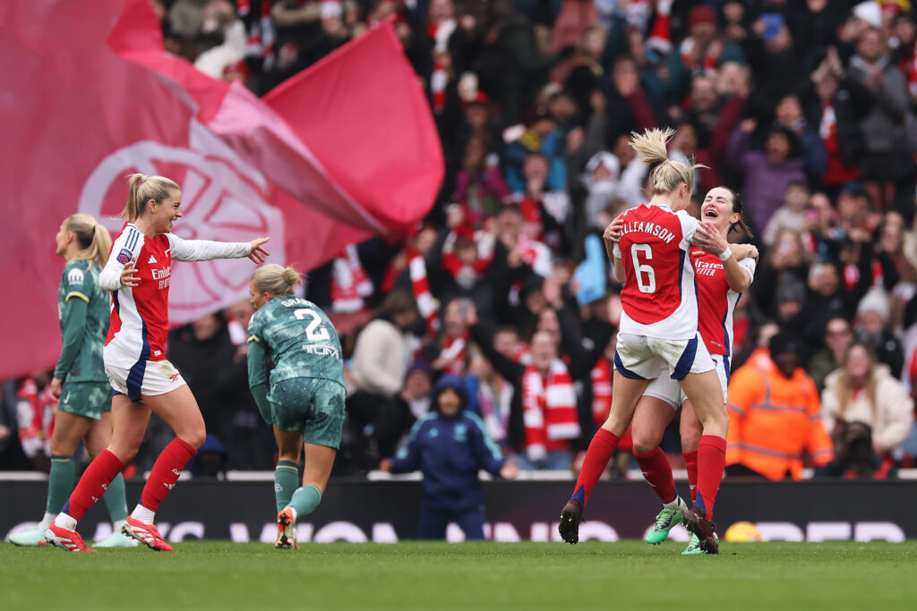 LONDON, ENGLAND - FEBRUARY 16: Emily Fox of Arsenal celebrates scoring her team's fifth goal with teammate Leah Williamson during the Barclays Women's Super League match between Arsenal FC and Tottenham Hotspur FC at Emirates Stadium on February 16, 2025 in London, England. (Photo by Richard Heathcote/Getty Images)