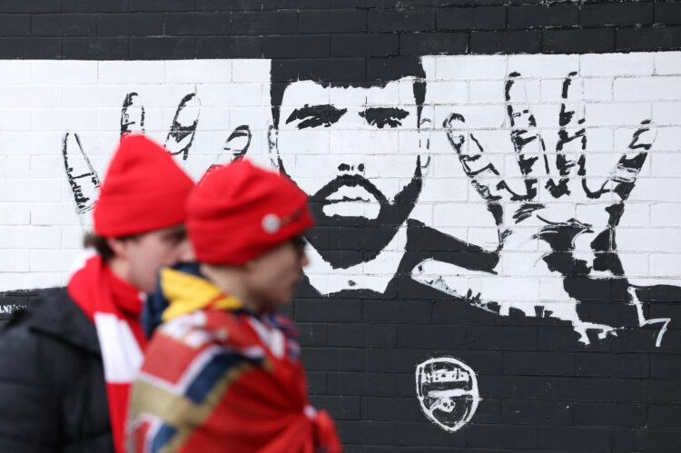 LONDON, ENGLAND - FEBRUARY 22: General view outside the stadium, as fans of Arsenal walk past a mural of David Raya of Arsenal (not pictured) prior...