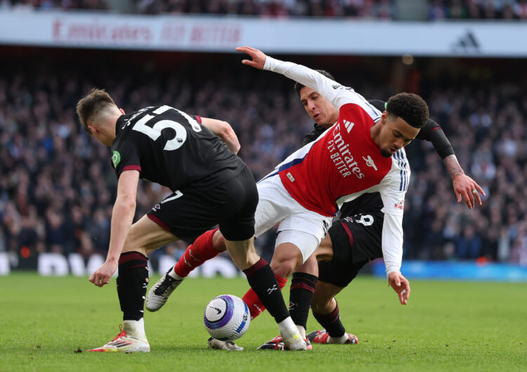 LONDON, ENGLAND - FEBRUARY 22: Ethan Nwaneri of Arsenal is challenged by Oliver Scarles and Edson Alvarez of West Ham United during the Premier Lea...