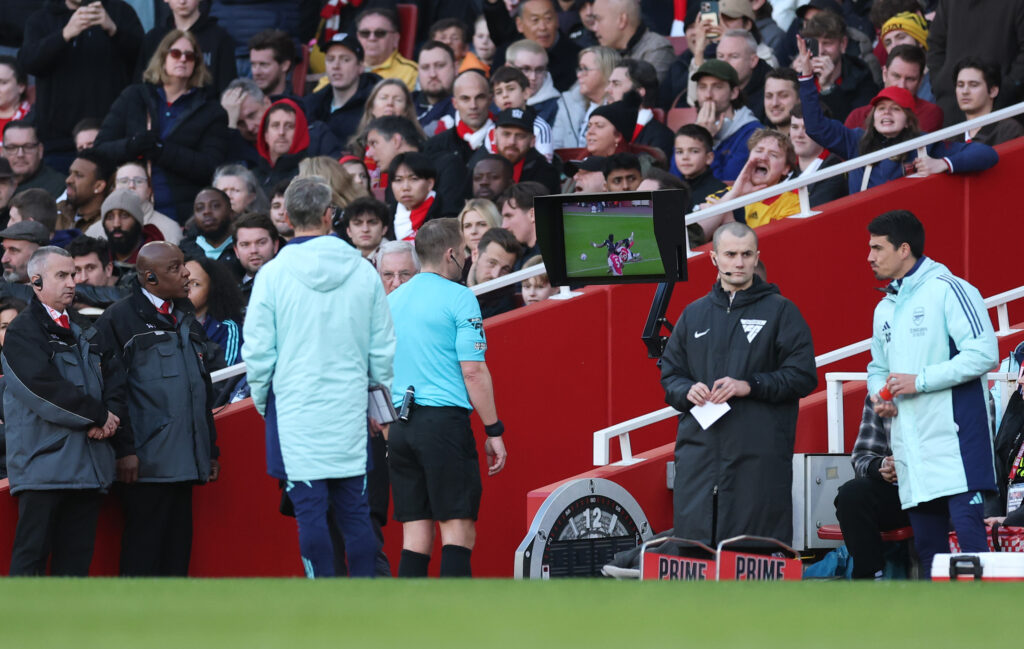 Mikel Arteta gives Ethan Nwaneri injury update 3 LONDON, ENGLAND - FEBRUARY 22: Referee Craig Pawson reviews the VAR monitor, resulting in Myles Lewis-Skelly of Arsenal (not pictured) receiving a red card, for denying a potential goal-scoring opportunity during the Premier League match between Arsenal FC and West Ham United FC at Emirates Stadium on February 22, 2025 in London, England. (Photo by Julian Finney/Getty Images)