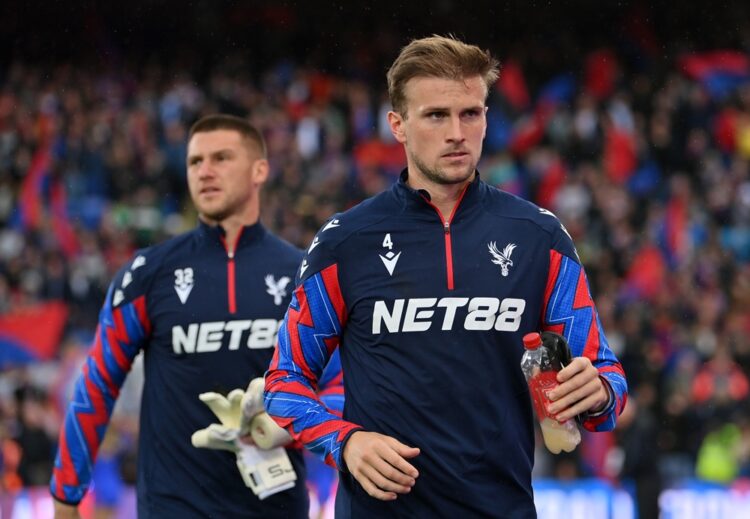 LONDON, ENGLAND: Rob Holding of Crystal Palace (right) and team-mate Sam Johnstone (left) look on prior to the Premier League match between Crystal...