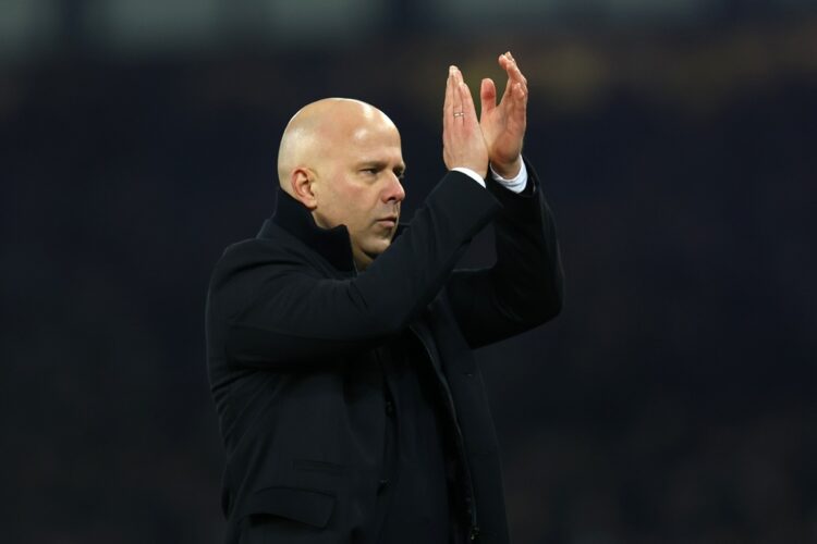 LIVERPOOL, ENGLAND: Arne Slot, Manger of Liverpool, applauds the fans at the end of the Premier League match between Everton FC and Liverpool FC at...