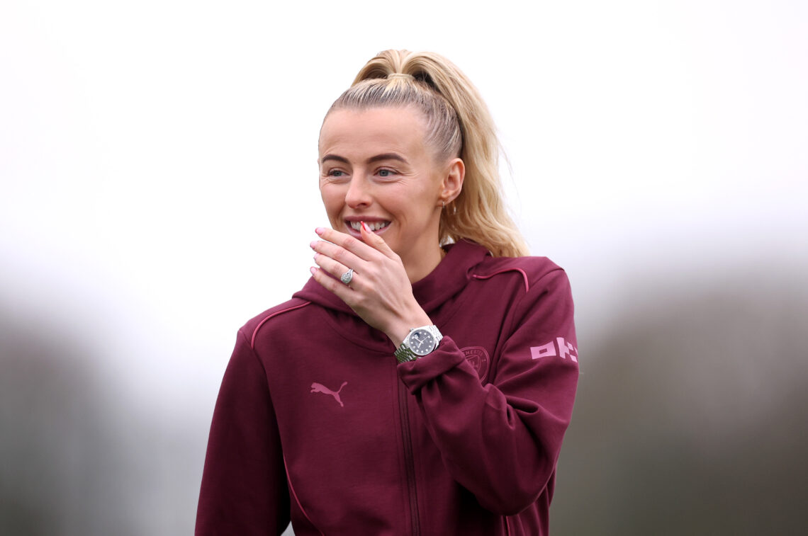 LIVERPOOL, ENGLAND - DECEMBER 15: Chloe Kelly of Manchester City reacts as she inspects the pitch prior to the Barclays Women's Super League match ...