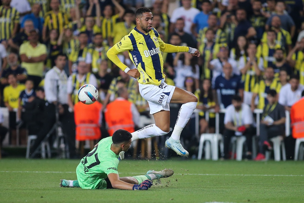 ISTANBUL, TURKEY: Youssef En-Nesyri of Fenerbahce is challenged by Deniz Eren Donmezer of Adana Demirspor during the Turkish Super League match between Fenerbahce and Adana Demirspor at Ulker Stadium on August 10, 2024. (Photo by Ahmad Mora/Getty Images)