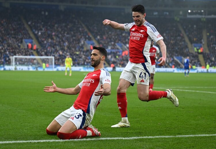 LEICESTER, ENGLAND: Mikel Merino of Arsenal celebrates with teammate Declan Rice after scoring his team's first goal during the Premier League matc...