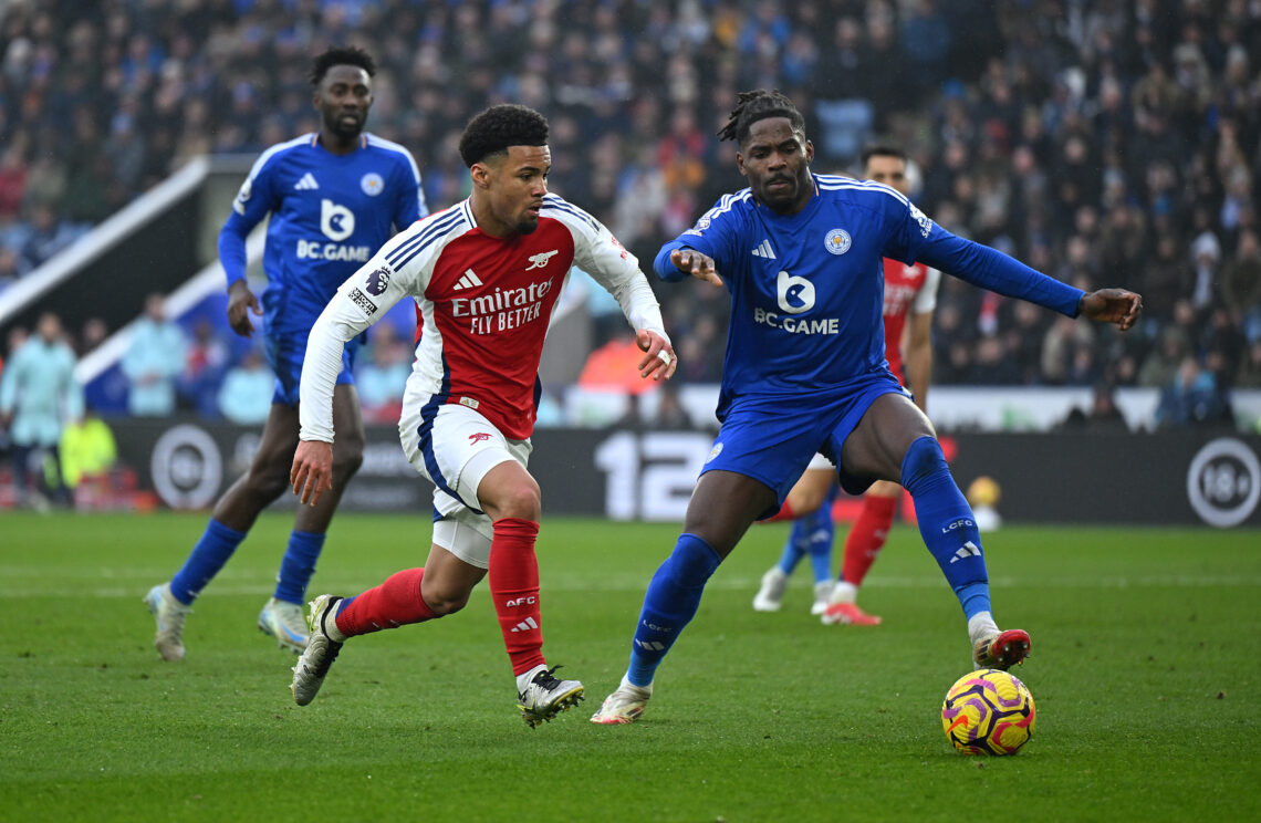 LEICESTER, ENGLAND - FEBRUARY 15: Ethan Nwaneri of Arsenal runs with the ball under pressure from Caleb Okoli of Leicester City during the Premier ...