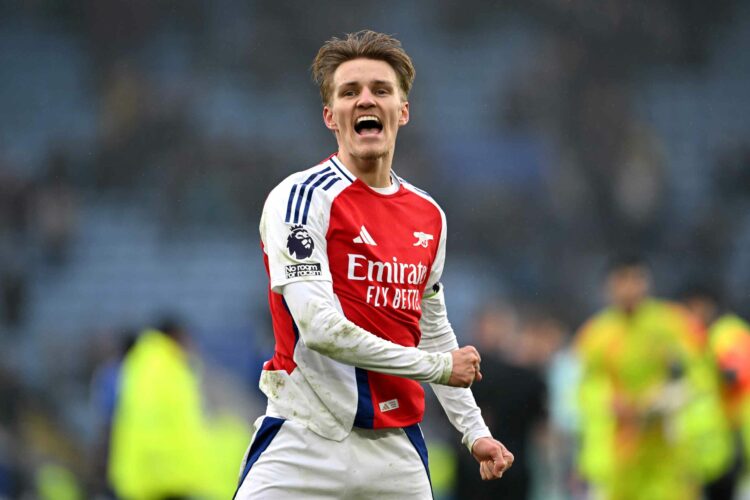 LEICESTER, ENGLAND - FEBRUARY 15: Martin Odegaard of Arsenal celebrates after Mikel Merino of Arsenal (not pictured) scores his team's second goal ...