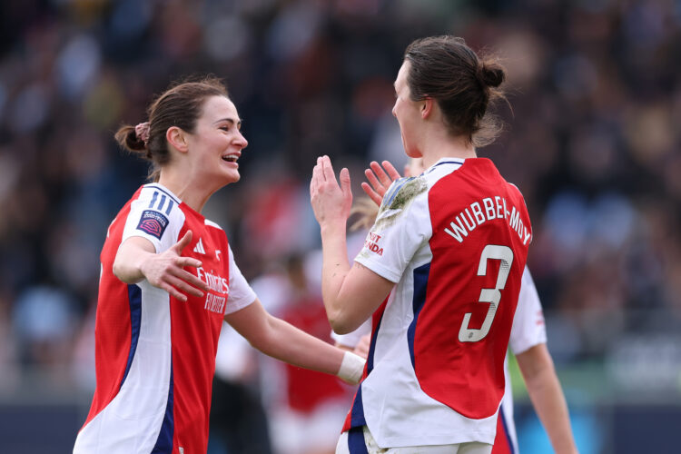 MANCHESTER, ENGLAND - FEBRUARY 02: Lotte Wubben-Moy of Arsenal celebrates with teammate Emily Fox after scoring her team's second goal during the B...