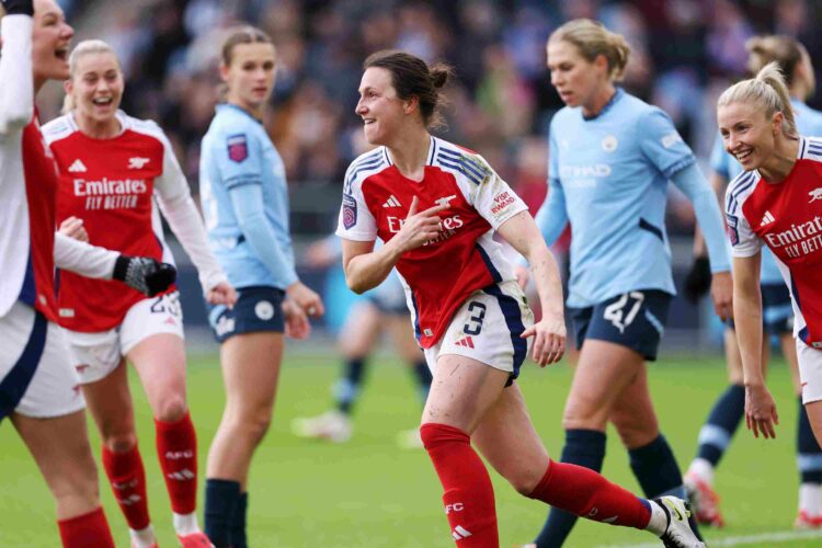MANCHESTER, ENGLAND - FEBRUARY 02: Lotte Wubben-Moy of Arsenal celebrates scoring her team's second goal during the Barclays Women's Super League m...
