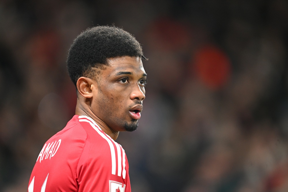 Manchester United top scorer to miss Arsenal match through injury 2 MANCHESTER, ENGLAND: Amad Diallo of Manchester United looks on during the Emirates FA Cup Fourth Round match between Manchester United and Leicester City at Old Trafford on February 07, 2025. (Photo by Michael Regan/Getty Images)