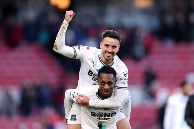 MIDDLESBROUGH, ENGLAND: Julio Pleguezuelo and Mickel Miller of Plymouth Argyle celebrate victory following the Sky Bet Championship match between M...
