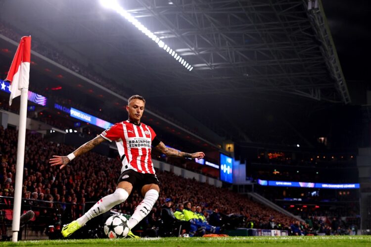 EINDHOVEN, NETHERLANDS: Noa Lang of PSV Eindhoven takes a corner kick during the UEFA Champions League 2024/25 League Phase MD4 match between PSV E...