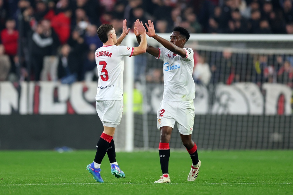 4th injury ends Arsenal loanee’s season 3 SEVILLE, SPAIN: Adria Pedrosa of Sevilla FC celebrates scoring his team's first goal with teammate Albert Sambi Lokonga during the LaLiga match between Sevilla FC and Valencia CF at Estadio Ramon Sanchez Pizjuan on January 11, 2025. (Photo by Fran Santiago/Getty Images)