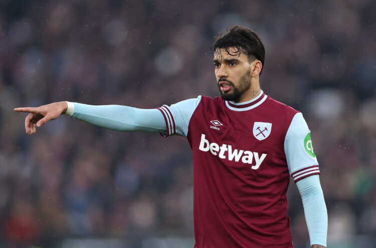 LONDON, ENGLAND - FEBRUARY 15: Lucas Paqueta of West Ham points instructions during the Premier League match between West Ham United FC and Brentfo...