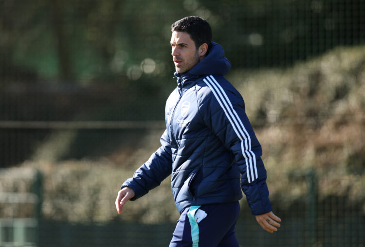 LONDON COLNEY, ENGLAND - MARCH 03: Mikel Arteta, Manager of Arsenal, walks out on to the training pitch during the UEFA Champions League 2024/25 Ro...