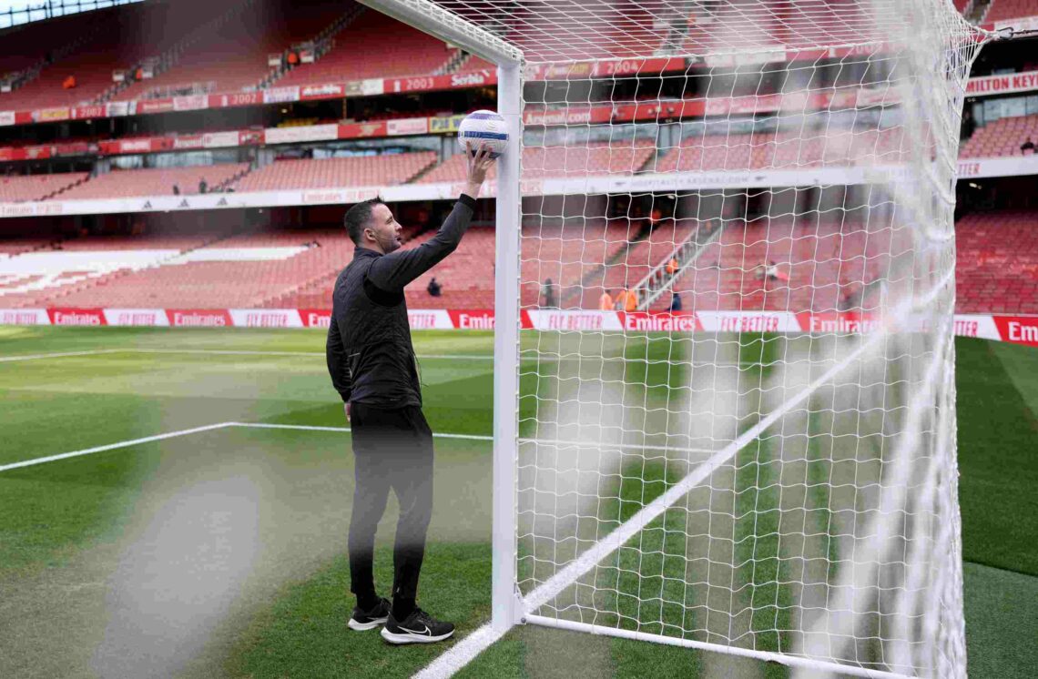 LONDON, ENGLAND - MARCH 16: Referee, Chris Kavanagh checks the GDS prior to the Premier League match between Arsenal FC and Chelsea FC at Emirates ...