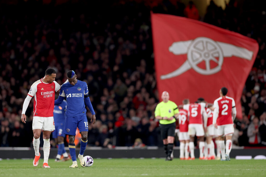 LONDON, ENGLAND - APRIL 23: Gabriel of Arsenal embraces Nicolas Jackson of Chelsea after Kai Havertz of Arsenal (hidden) scored his team's fourth goal during the Premier League match between Arsenal FC and Chelsea FC at Emirates Stadium on April 23, 2024 in London, England. (Photo by Alex Pantling/Getty Images)