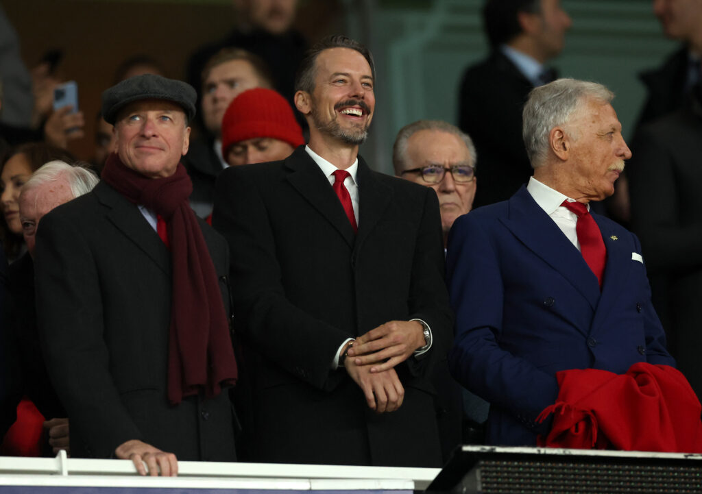 LONDON, ENGLAND - OCTOBER 01: Arsenal Executive Vice-Chair Tim Lewis (L) and Arsenal Director Josh Kroenke (R) react prior to the UEFA Champions League 2024/25 League Phase MD2 match between Arsenal FC and Paris Saint-Germain at Emirates Stadium on October 01, 2024 in London, England. (Photo by Julian Finney/Getty Images)