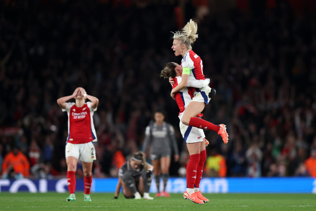 LONDON, ENGLAND - MARCH 26: Leah Williamson and Steph Catley of Arsenal celebrate after the team's victory and progression to the Semi-Final after the UEFA Women's Champions League Quarter Finals Second Leg match between Arsenal FC and Real Madrid CF at Emirates Stadium on March 26, 2025 in London, England. (Photo by Alex Pantling/Getty Images)