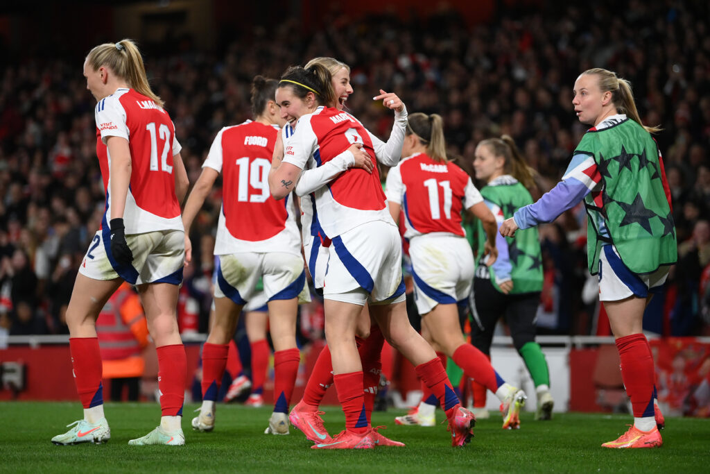 LONDON, ENGLAND - MARCH 26: Mariona Caldentey of Arsenal celebrates scoring her team's second goal with Chloe Kelly and Beth Mead during the UEFA Women's Champions League Quarter Finals Second Leg match between Arsenal FC and Real Madrid CF at Emirates Stadium on March 26, 2025 in London, England. (Photo by Justin Setterfield/Getty Images)