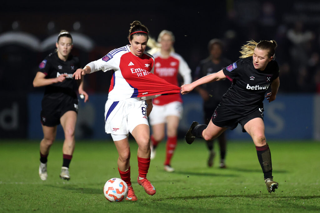 Arsenal win thriller against West Ham, Slegers, Williamson & Caldentey react 5 BOREHAMWOOD, ENGLAND - MARCH 02: Mariona Caldentey of Arsenal battles for possession with Oona Siren of West Ham United during the Barclays Women's Super League match between Arsenal FC and West Ham United FC at Mangata Pay UK Stadium on March 02, 2025 in Borehamwood, England. (Photo by Alex Pantling/Getty Images)