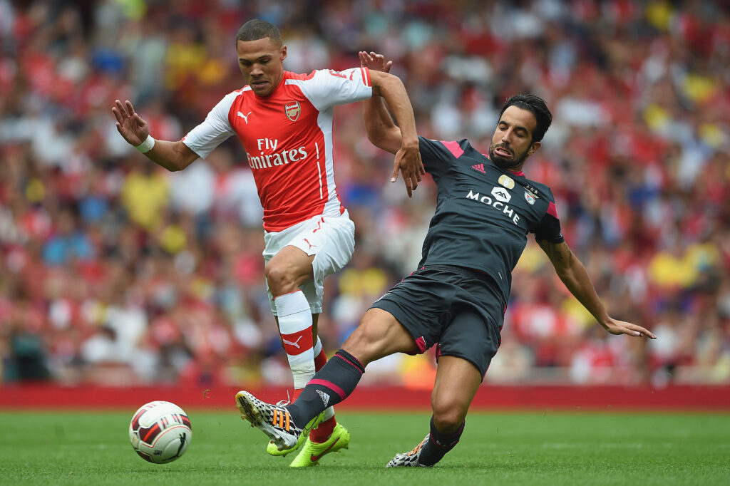 LONDON, ENGLAND - AUGUST 02: Kieran Gibbs of Arsenal in action with Ruben Amorim of Benfica during the Emirates Cup match between Arsenal and Benfica at the Emirates Stadium on August 2, 2014 in London, England. (Photo by Michael Regan/Getty Images)