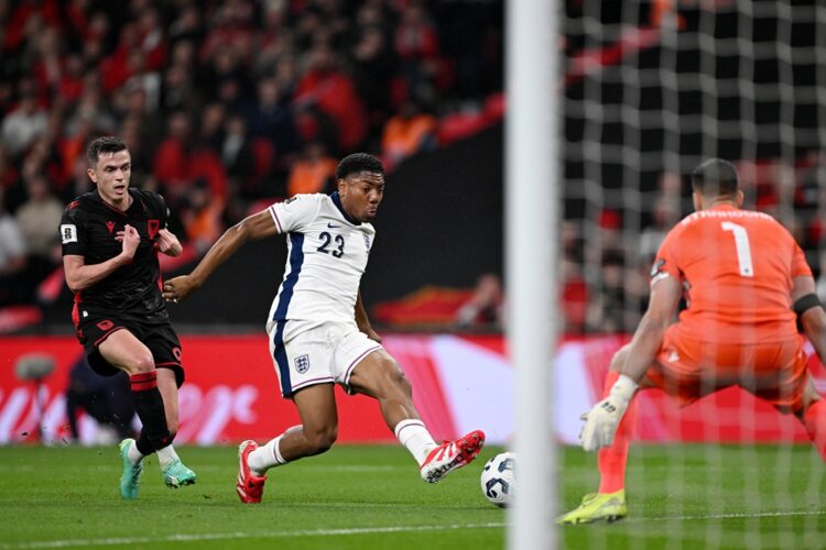 LONDON, ENGLAND: Myles Lewis-Skelly of England scores his team's first goal during the FIFA World Cup 2026 European Qualifier between England and A...