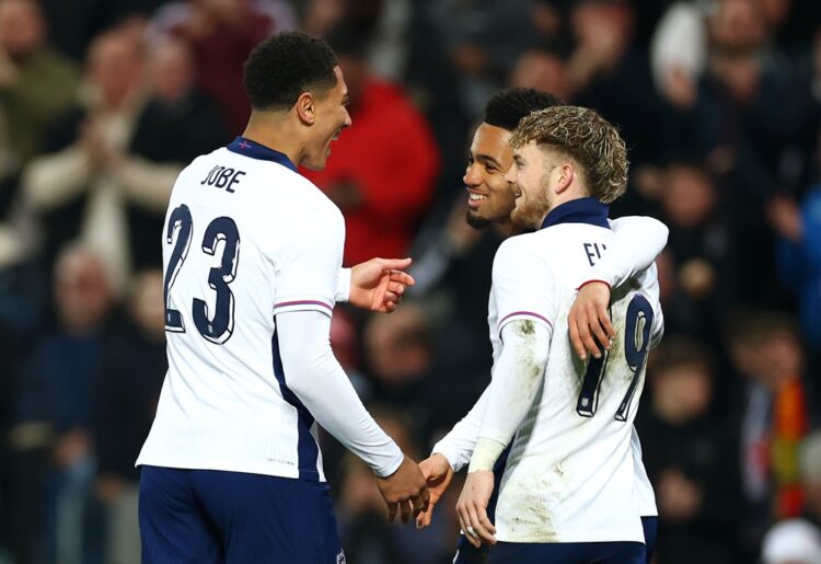 WEST BROMWICH, ENGLAND: Ethan Nwaneri of England celebrates scoring his team's second goal with teammates Jobe Bellingham and Harvey Elliott during...