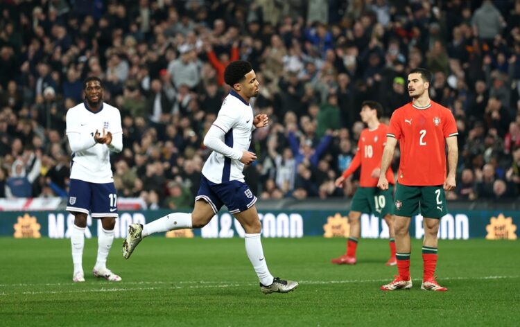 WEST BROMWICH, ENGLAND: Ethan Nwaneri of England celebrates scoring his team's second goal during the Men's U21 international match between England...