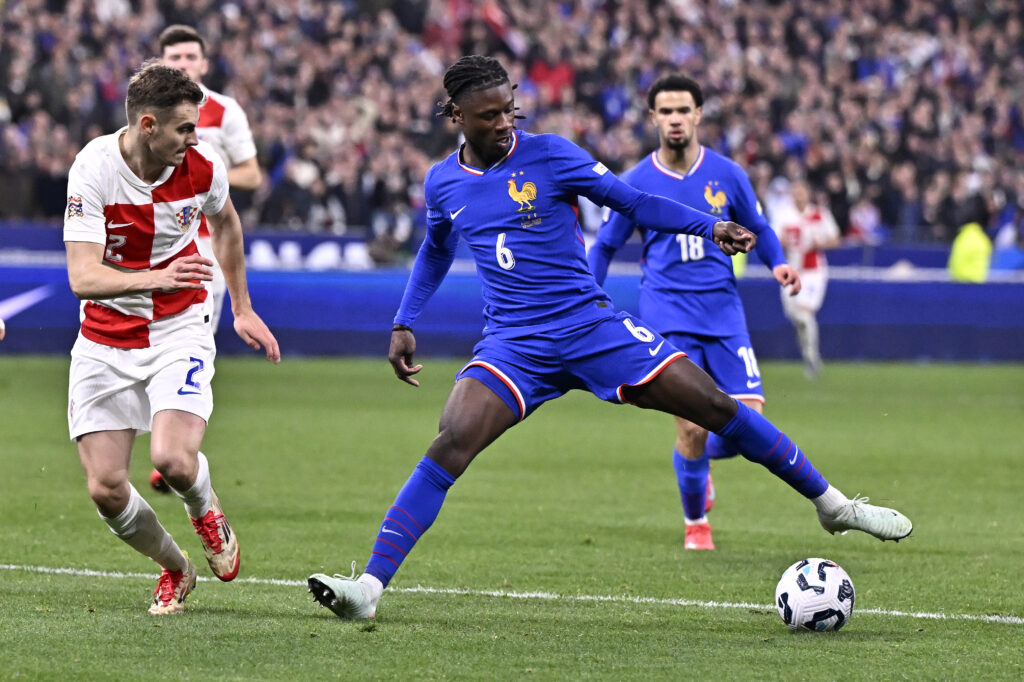 PARIS, FRANCE - MARCH 23: Eduardo Camavinga of France runs with the ball during the UEFA Nations League Quarterfinal Leg Two match between Croatia and France at Stade de France on March 23, 2025 in Paris, France. (Photo by Aurelien Meunier/Getty Images)