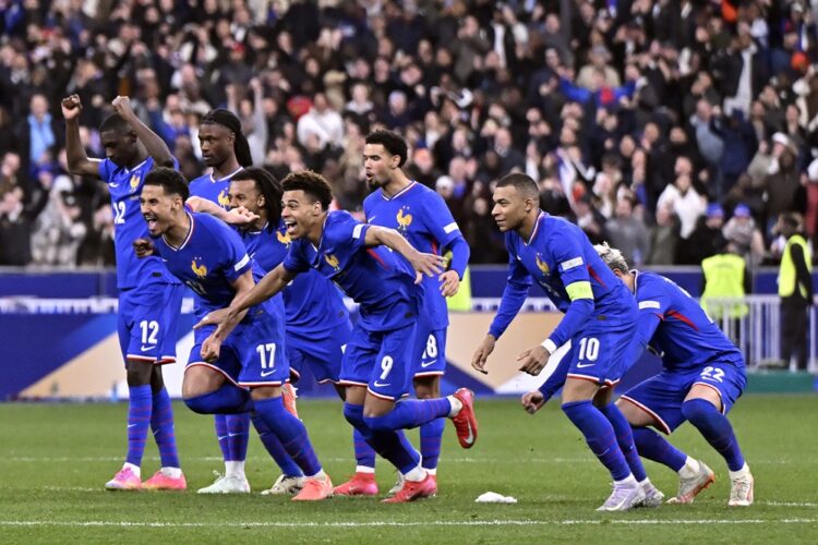 PARIS, FRANCE: Randal Kolo Muani, William Saliba, Desire Doue, Eduardo Camavinga, Warren Zaire Emery and Kylian Mbappe of France celebrate after wi...