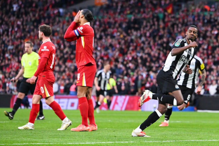 LONDON, ENGLAND - MARCH 16: Alexander Isak of Newcastle United celebrates scoring his team's second goal as Virgil van Dijk of Liverpool looks deje...