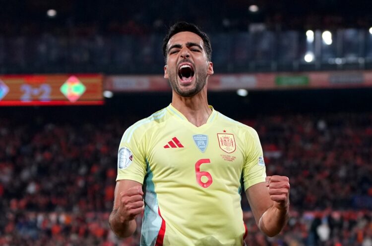 ROTTERDAM, NETHERLANDS: Mikel Merino of Spain celebrates scoring his team's second goal during the UEFA Nations League quarterfinal leg one match b...
