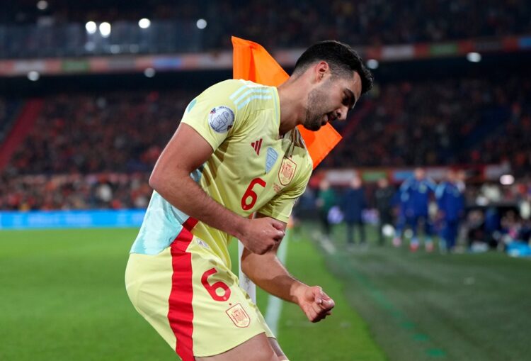 ROTTERDAM, NETHERLANDS: Mikel Merino of Spain celebrates scoring his team's second goal during the UEFA Nations League quarterfinal leg one match b...