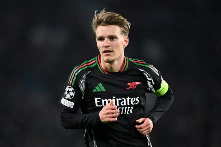 EINDHOVEN, NETHERLANDS: Martin Odegaard of Arsenal during the UEFA Champions League 2024/25 UEFA Champions League 2024/25 Round of 16 first leg mat...