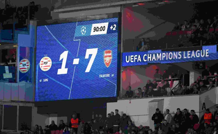 EINDHOVEN, NETHERLANDS - MARCH 04: A general view of the LED screen which displays the score during the UEFA Champions League 2024/25 UEFA Champion...
