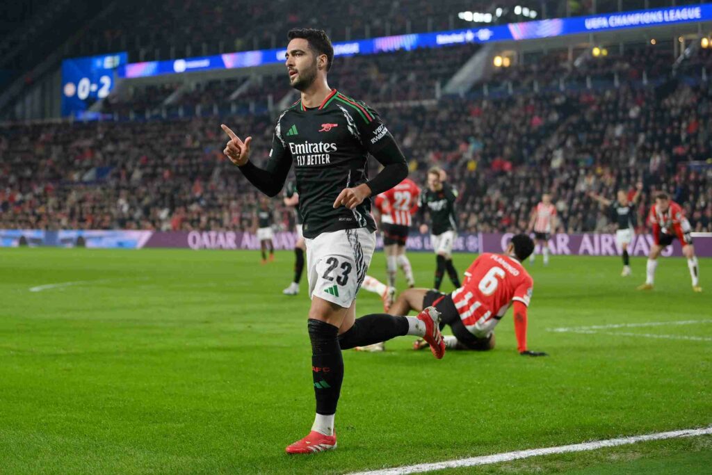 EINDHOVEN, NETHERLANDS - MARCH 04: Mikel Merino of Arsenal celebrates scoring his team's third goal during the UEFA Champions League 2024/25 UEFA Champions League 2024/25 Round of 16 first leg match between PSV and Arsenal FC at PSV Stadion on March 04, 2025 in Eindhoven, Netherlands. (Photo by Justin Setterfield/Getty Images)